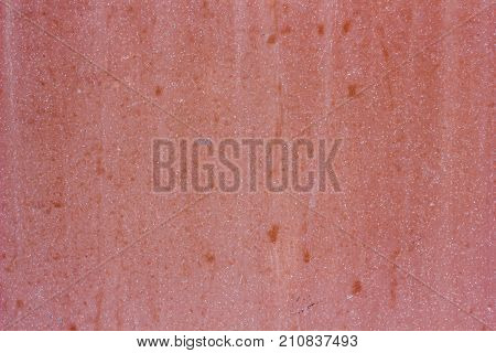 Pink plaster concrete wall texture as a background