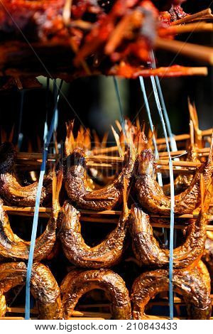Spicy, succulent seafood on display on a streetside cafe in Nepal