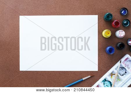 Emptry drawing paper and color on wooden board Top view