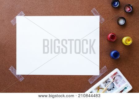 Emptry drawing paper and color on wooden board Top view