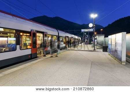 Train Station Of Lamone With People On Movement