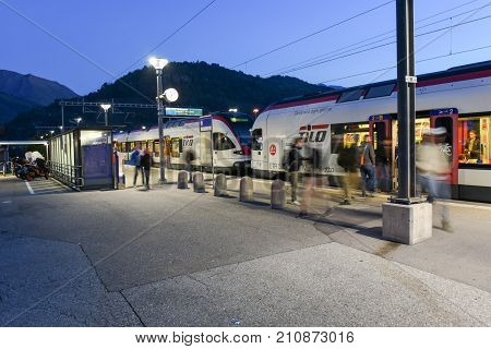 Train Station Of Lamone With People On Movement