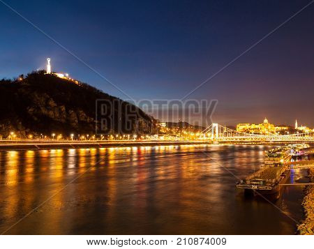 Evening view of Gellert hill and Danube river in Budapest, Hungary.