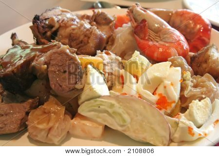 Agnello e gamberi