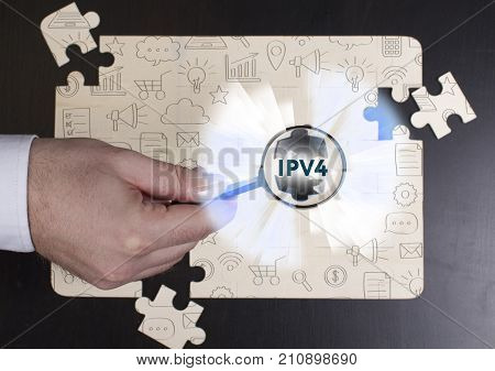 Business, Technology, Internet And Network Concept. Young Businessman Shows The Word: Ipv4