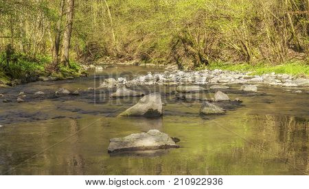 waterside scenery at Kupfer river in Hohenlohe a area in Southern Germany at early spring time