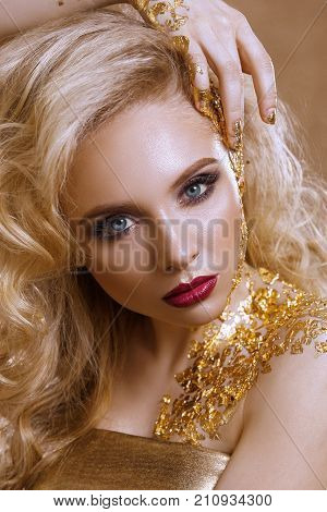 Beauty Woman ,  Blond  Hair , Professional Make-up , Gold Color.