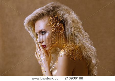 Beauty Woman ,  Blond  Hair , Professional Make-up , Gold Color.