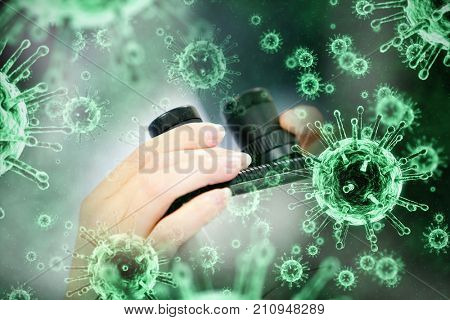 Digital image of green virus against close up of a female scientist looking through a microscope