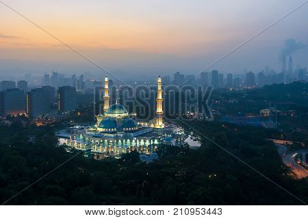 Aerial view of Federal Territory Mosque during sunrise. Federal Territory Mosque is a major mosque in Kuala Lumpur Malaysia