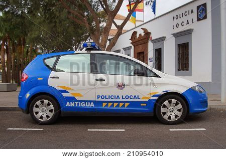 Antiqua, Fuerteventura, Canary Islands, Spain - October 22, 2017: Spanish local police car, Seat Altea, parked by the side of the road in the city of Antiqua. Nobody in the vehicle.