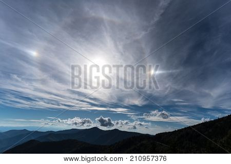 A sundog over the Blue Ridge Mountains on a warm Autumn day in North Carolina.
