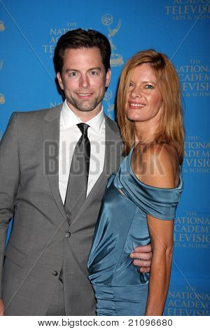 LOS ANGELES - JUN 17:  Michael Muhney, Michelle Stafford arrive at the 38th Annual Daytime Creative Arts & Entertainment Emmy Awards at Westin Bonaventure Hotel on June 17, 2011 in Los Angeles, CA