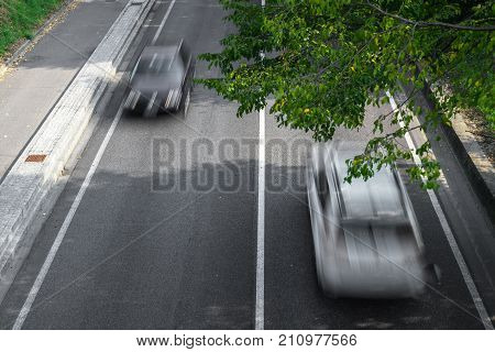 Motion blur of cars in aerial view over the road. (Speed limits - Infractions - Speed Camera)