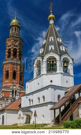 Bell Tower Of St. John The Theologian Monastery In The Background Of Clear Sky
