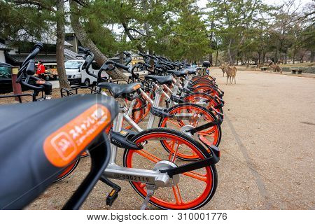 Nara, Japan, January 15 2019 : Japan Public Travel Bikes Of Docomo Company Parked For Tourists Inter