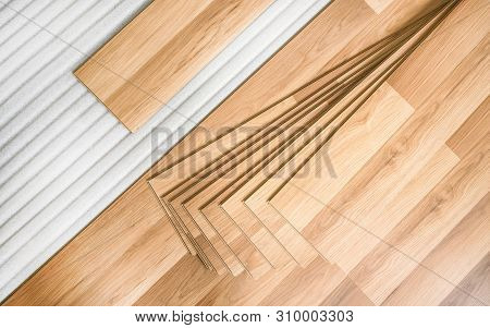 Tiles Of Laminated Floor With Wooden Effect Laying On White Base Foam, Ready To Be Installed, Top Do