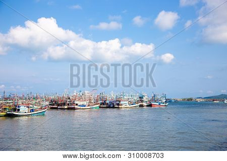 Fisherman Boat And Transportation In Seafood Industry At Seashore