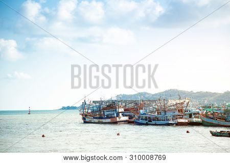 Fisherman Boat And Transportation In Seafood Industry At Seashore