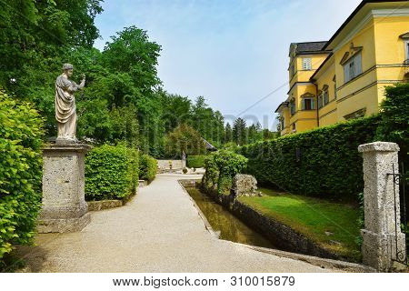 Salzburg, Austria - May 25, 2019 : Trick Fountains And Sculptures At The  Public Gardens Of Hellbrun