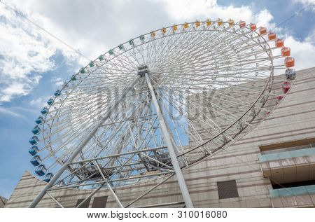 Taipei, Taiwan - Jun 8th, 2019: Ferris wheel and Miramar entertainment shopping mall in Dazhi, Taipei, Taiwan, Asia