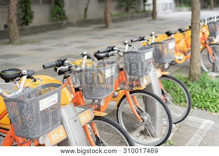 Taipei, Taiwan - May 12th, 2019:row of bicycles called Ubike, a bike sharing system service used by citizens as short-distance transit vehicles in Taipei, Taiwan, Asia