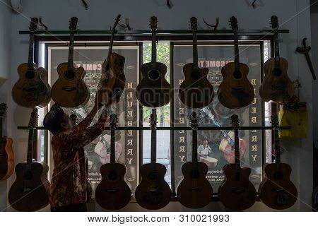 Gianyar,bali/indonesia-may 30 2019: I Wayan Tuges, The Owner Of The Tuges And Blueberry Carving Guit