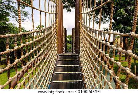 Wooden Bridge With Strong Robe At Playground Perspective