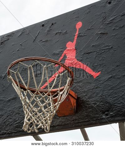 Kyiv, Ukraine -  April 21, 2016: Jumpman Logo By Nike Painted On The Black Backboard Of The Old Bask