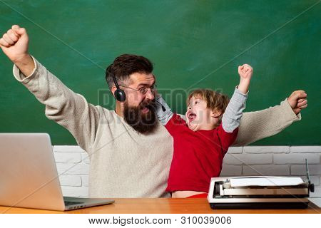 School Children. Hurray. Father And Son. Child Showing Winner Sign. Chalkboard Ready For Text.
