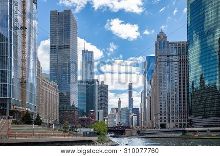 Chicago City Skyscrapers On The River Canal, Blue Sky Background
