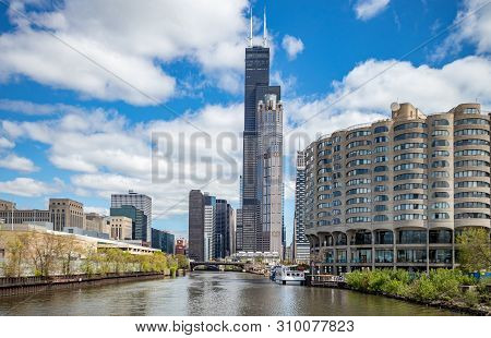 Chicago City Skyscrapers On The River Canal, Blue Sky Background