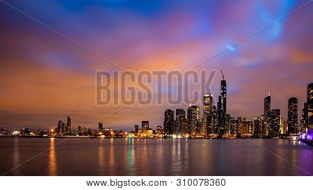 Panoramic View Of Chicago City High Rise Buildings Cloudy Sky In The Evening