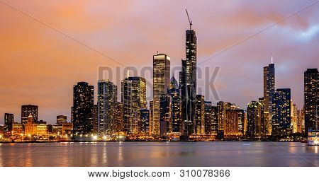 Panoramic View Of Chicago City High Rise Buildings Cloudy Sky In The Evening