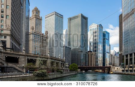 Chicago City Skyscrapers On The River Canal, Blue Sky Background