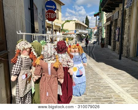 Lefkara, Cyprus - May 10, 2019: Shop With Dolls And Street In The Village Of Lefkara