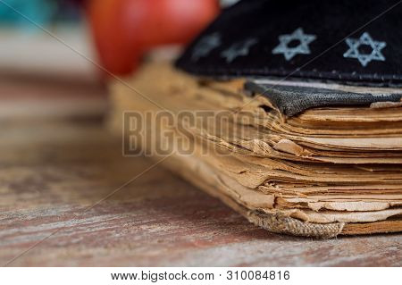 The Jewish Hebrew Prayer Book On A Synagogue With Kippah