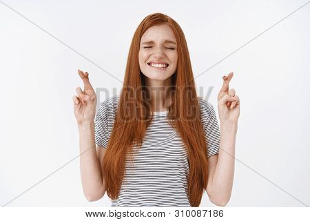 Hopeful Nervous Cute Redhead Girl High Hopes Bite Lower Lip Cross Fingers Good Luck Make Wish Desire