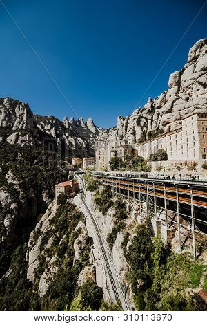 Monserrat, Spain - April, 2019: Santa Maria De Montserrat Abbey In Monistrol De Montserrat, Cataloni