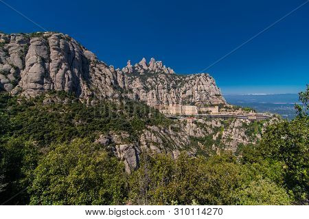 Aerial View On Santa Maria De Montserrat Abbey In Montserrat Mountains, Spain