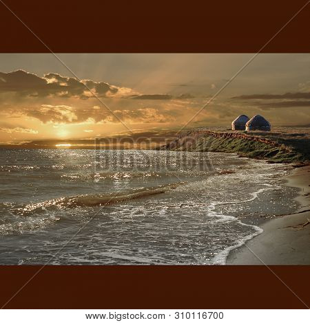 Fantastie Sunset Of Lartaudarkuk.sandi Beach Washed Bu The Wave And The Sun.yurts On A Steep Lank In