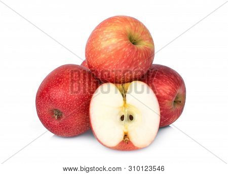 Whole And Half Pink Lady Apple Isolated On White Background