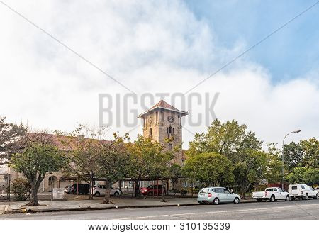 Standerton, South Africa - May 2, 2019: A Street Scene, With The Magistrates Offices And Vehicles, I