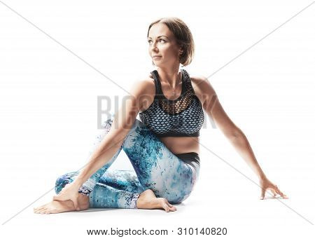 Beautiful Young Woman Practicing Yoga On White Background. Inspirational Mood, Complex Asana, Embrac