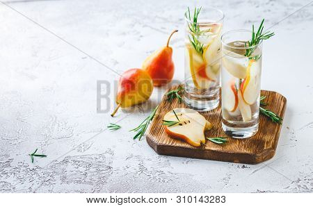 Summer Drinks, Rosemary Pear Cocktails With Ice In Glasses. Refreshing Summer Homemade Alcoholic Or 