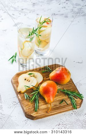 Summer Drinks, Rosemary Pear Cocktails With Ice In Glasses. Refreshing Summer Homemade Alcoholic Or 