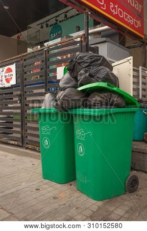 Bengaluru, India June 27, 2019 : Green Big Trash Box With Swachh Bharat Printed On Them, Green Litte