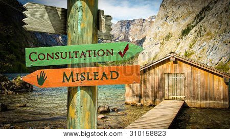 Street Sign The Direction Way To Consultation Versus Mislead