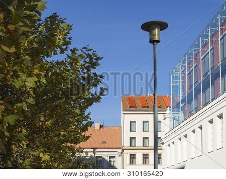 Prague, Czech Republic, April 13, 2019: View Of Office Complex Corso Karlin With Street Lamp And Map