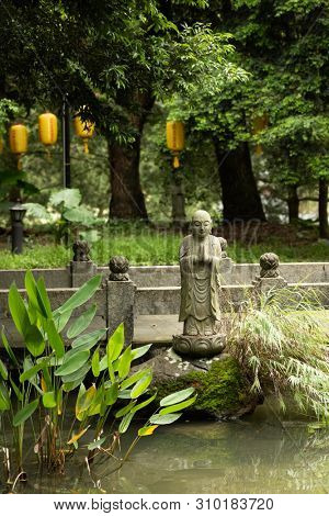 stone statue of Earth Store Bodhisattva(k?itigarbha bodhisattva) in a garden